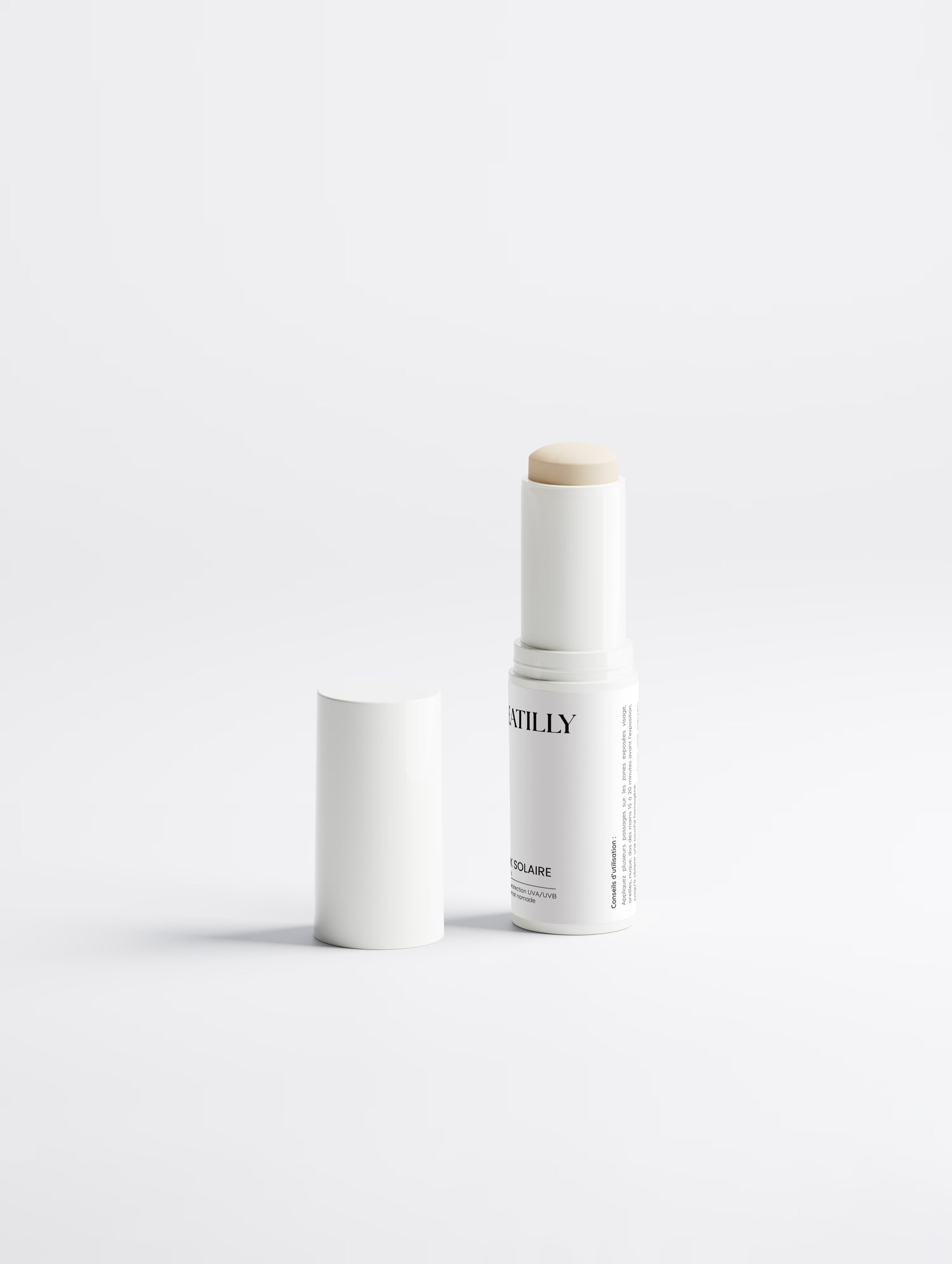 Stick Le Stick Solaire Sheatilly SPF 50, 12 g, ouvert avec son capuchon